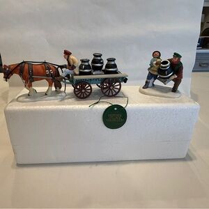 Department 56 Heritage Village – “New Potbellied Stove for Christmas” (Set of 2)